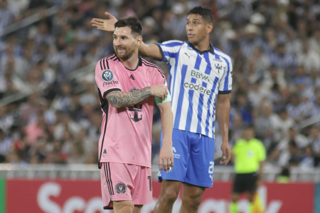 Lionel Messi #10 of Inter Miami and Luis Romo #27 of